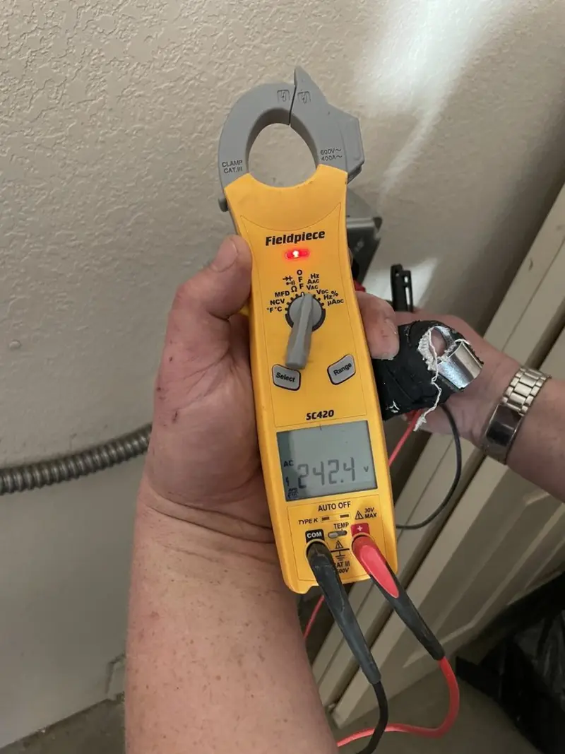 Voltage testing with clamp meter during Generator Installation in Williams